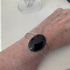 Silver and onyx bracelet, large stone